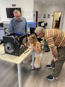 Women operate 3D printer